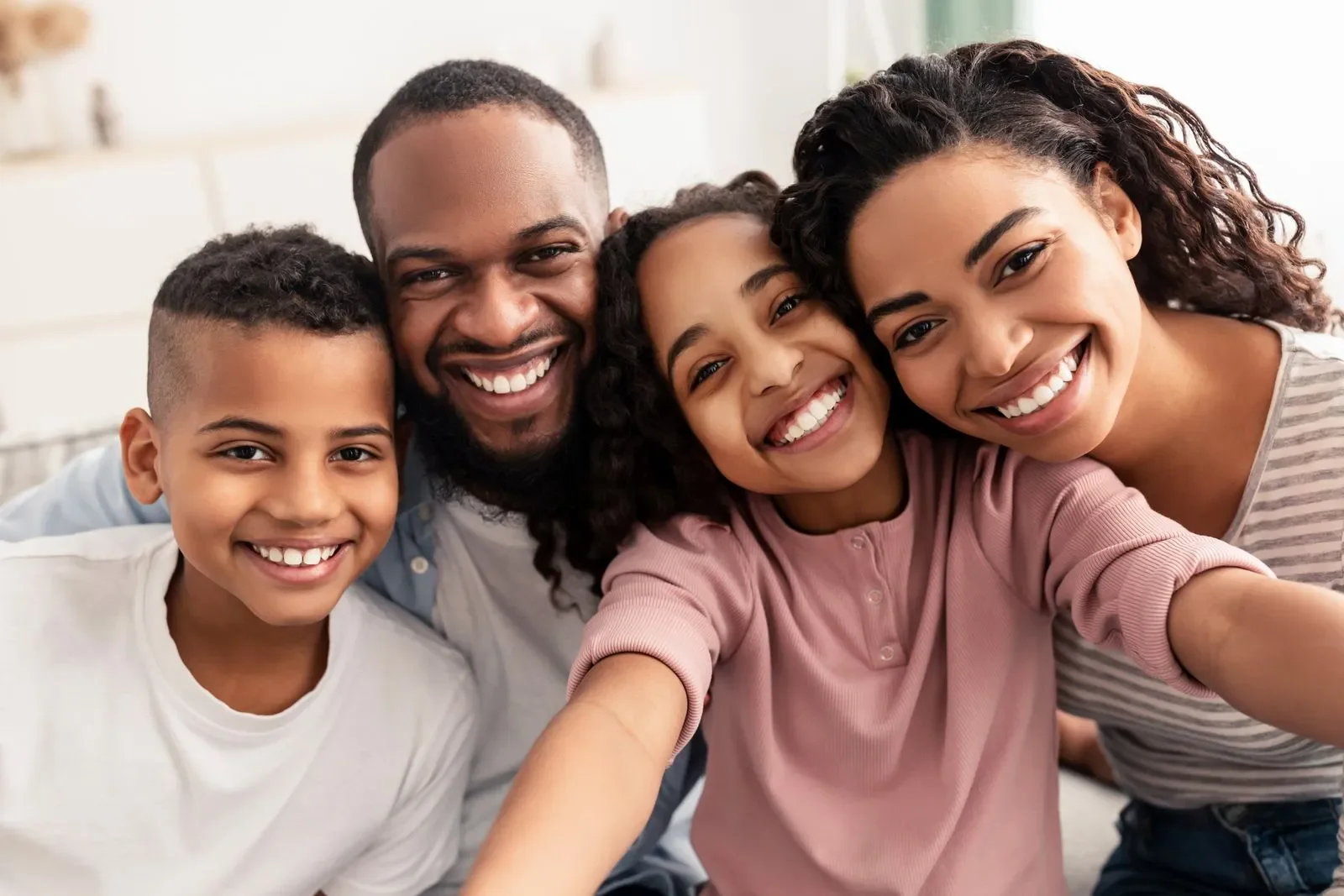 Multi-generational family smiling together
